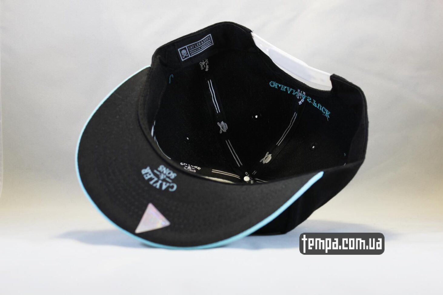 голубая кепка Snapback Cayler and Sons Diamond черная с голубым корызрьком голубая кепка Snapback Cayler and Sons Diamond черная с голубым корызрьком